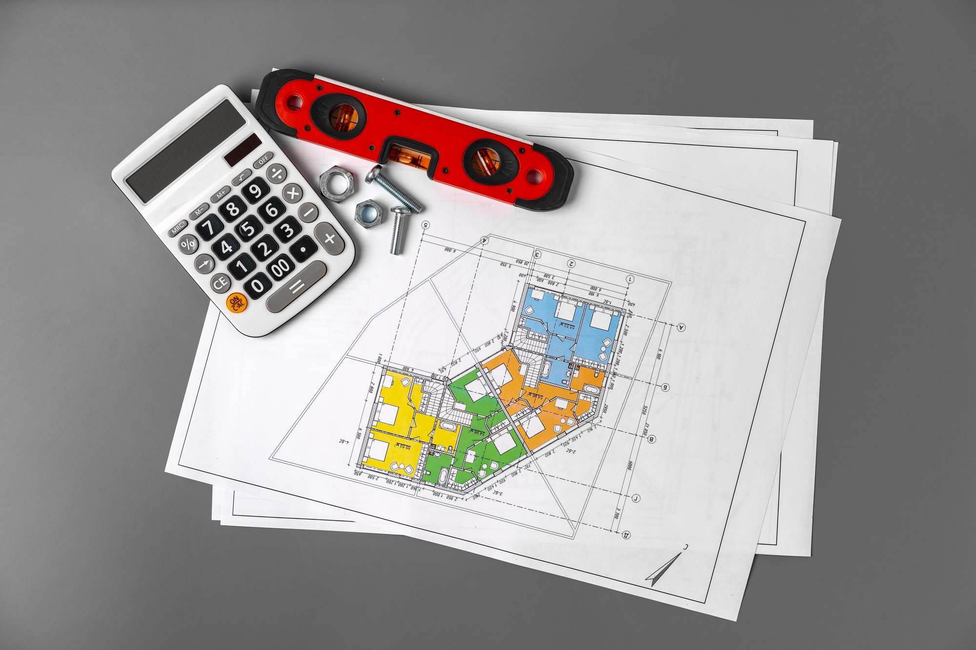 Architectural construction plans paper on table close up